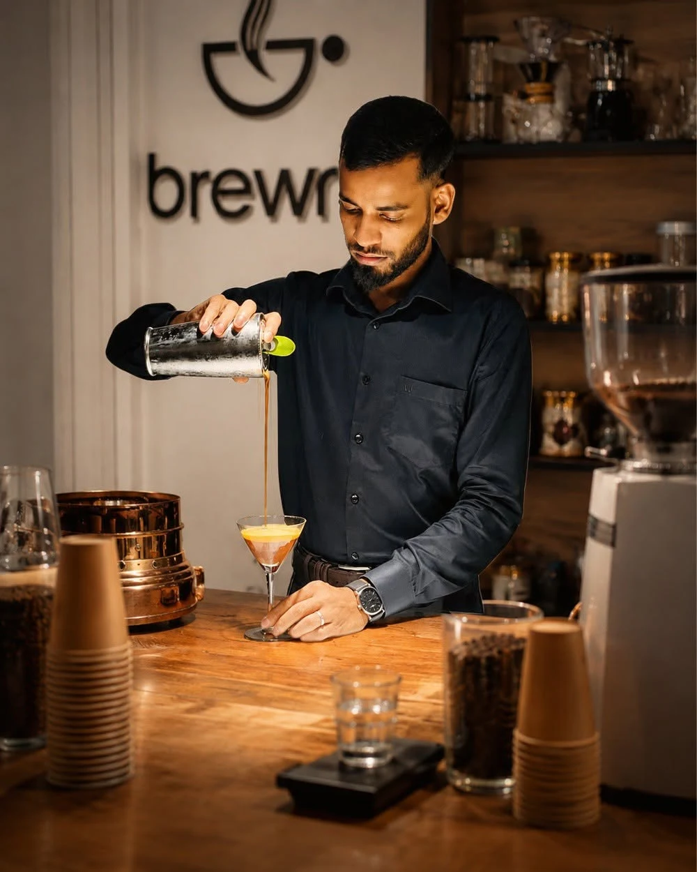 Emrajul Khan Dipu carefully preparing a pour-over coffee